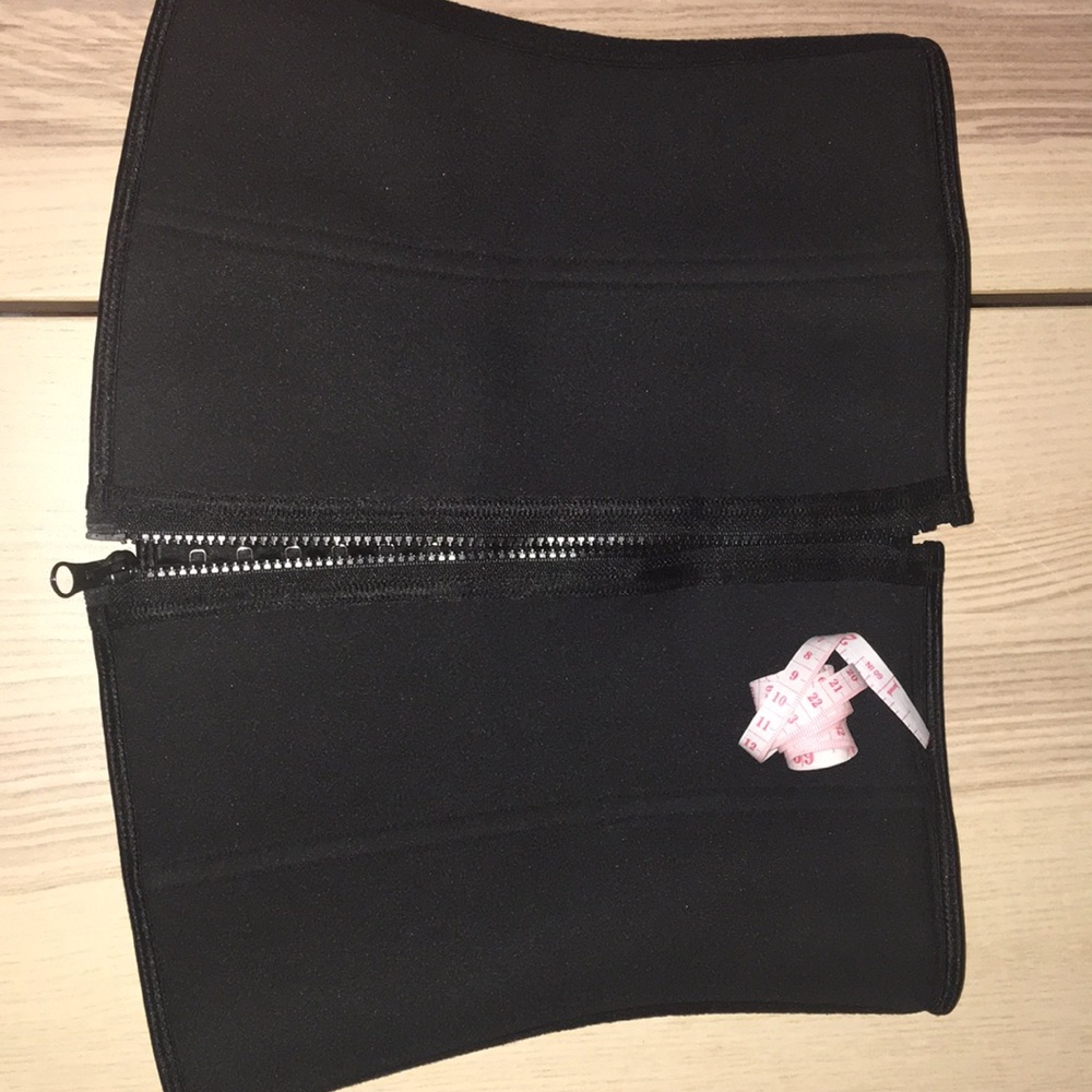 Waist trainer.Never used.Comes with measuring tape